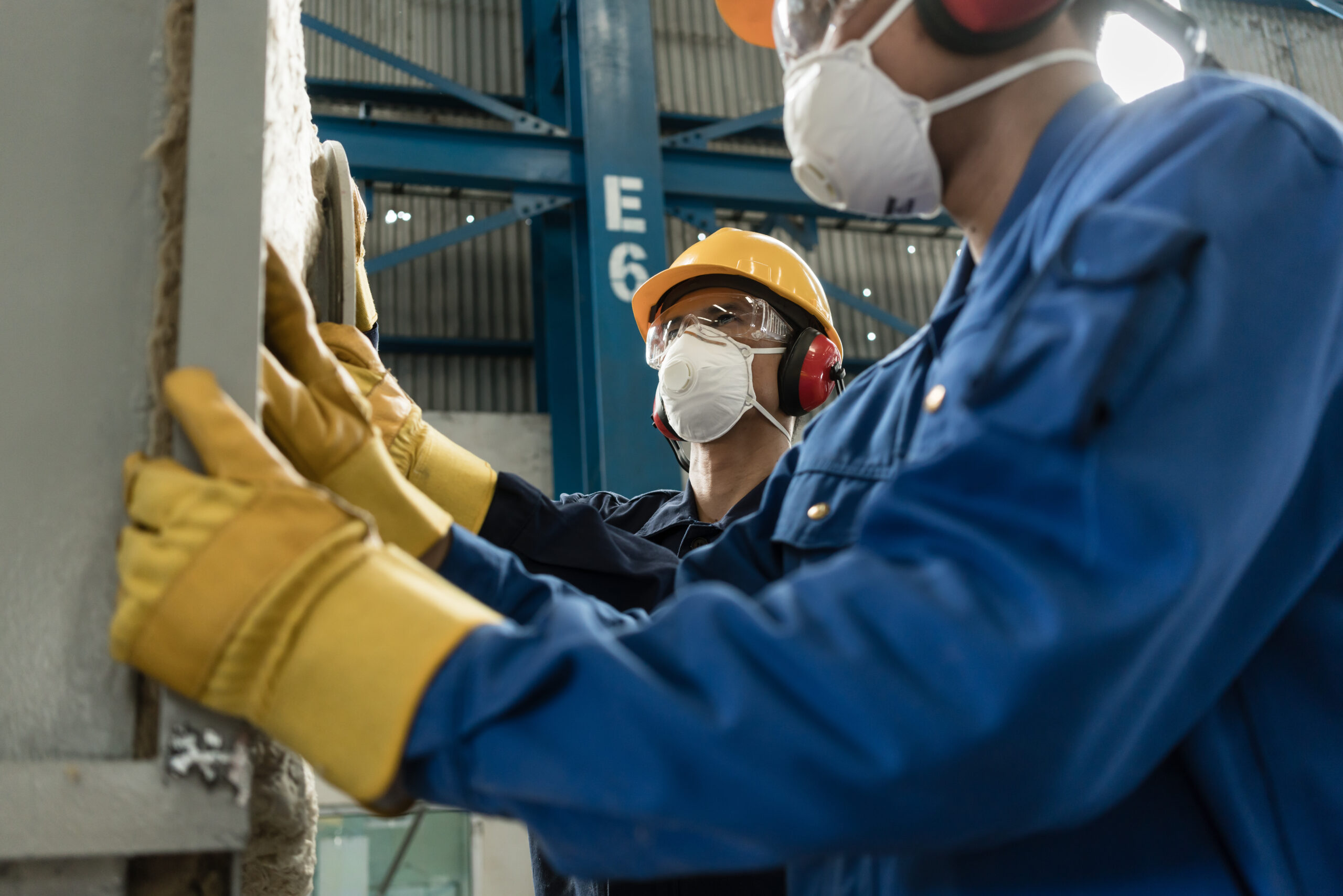 industrial workers wearing safety gear