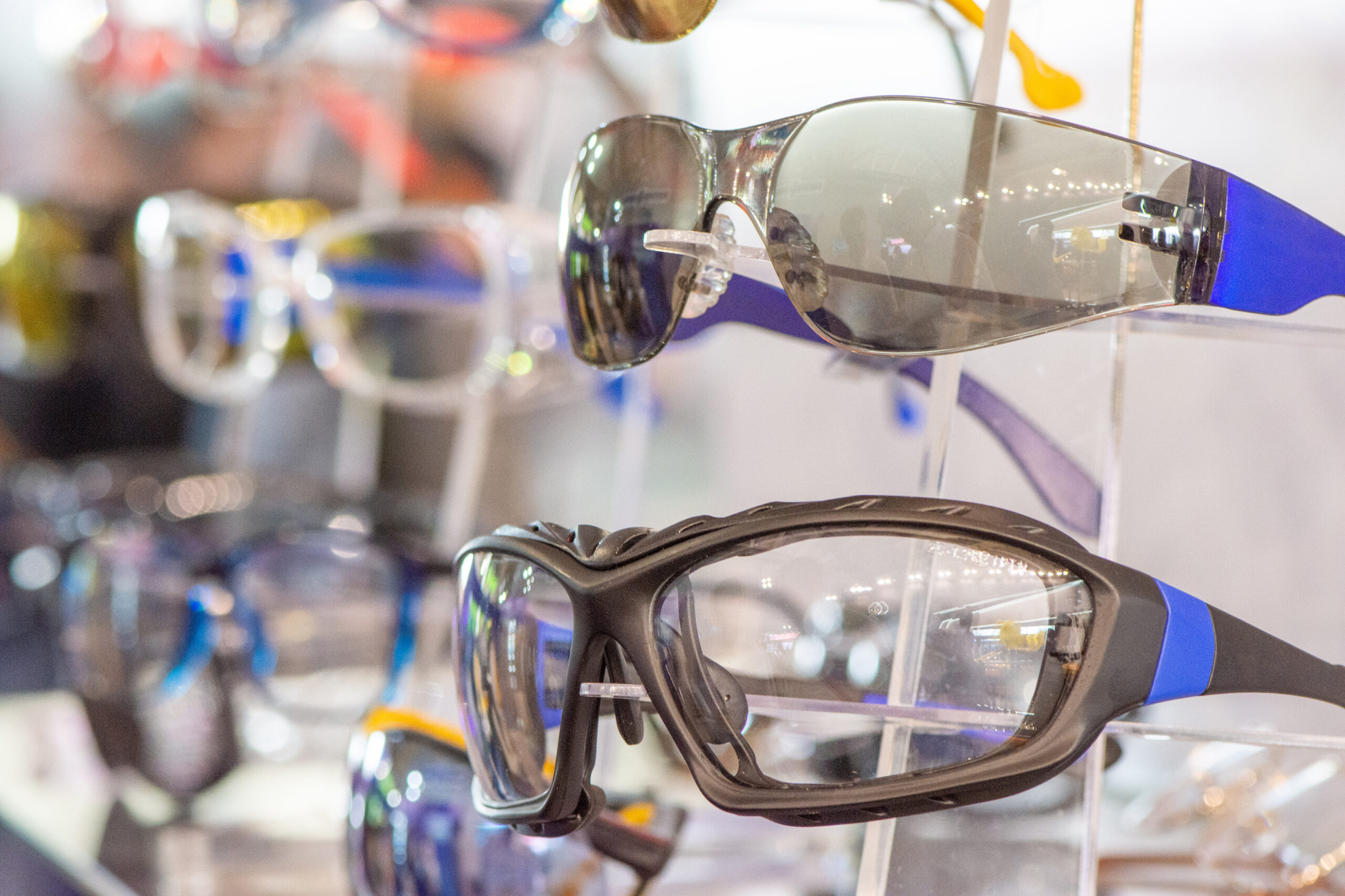 two pairs of prescription safety glasses on display